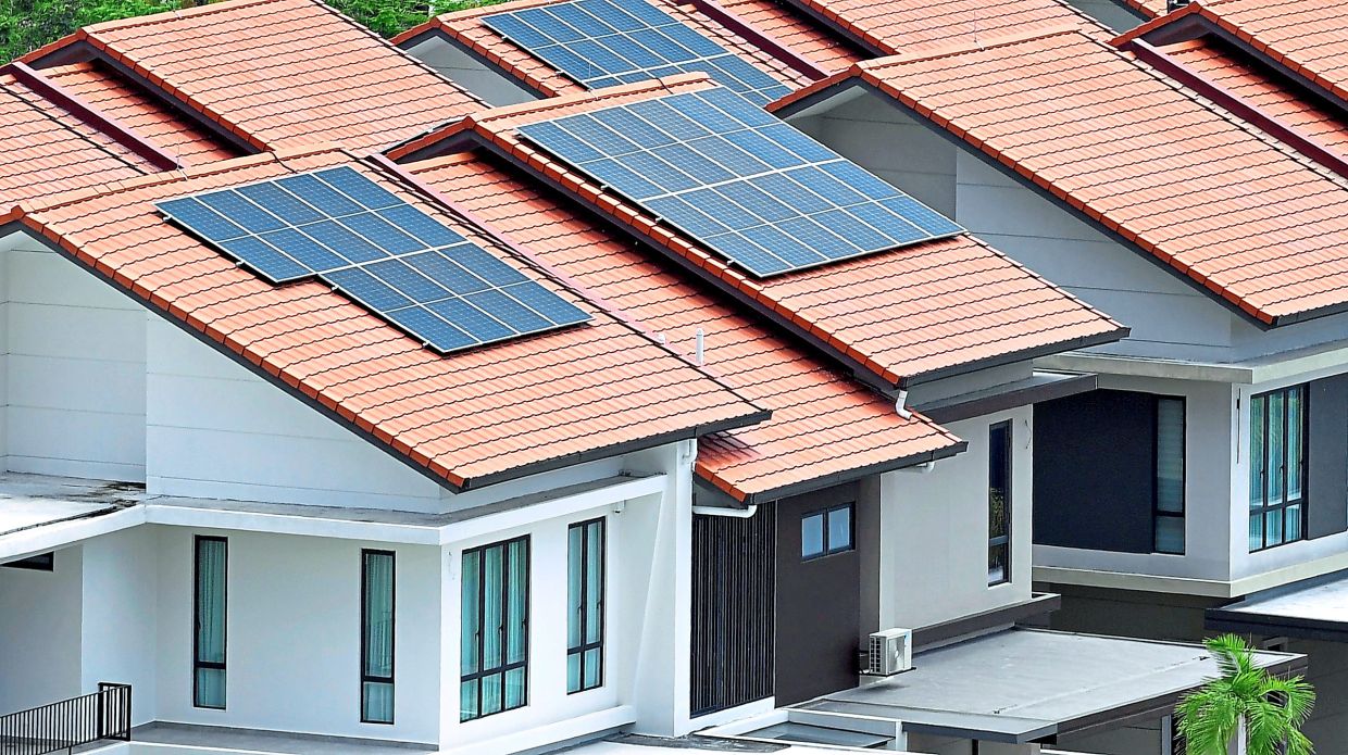 With Solar ATAP, energy consumers generate their own electricity by installing solar PV systems on the rooftop and supply excess to TNB grid. —AZHAR MAHFOF/The Star.