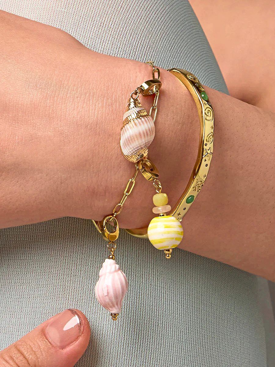 The craze for dangling charms will not go away soon, and these conches might just hit the spot for you. Photo: Wanderlust + Co