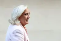 Le Pen seeks to woo French business leaders at first presidential debate