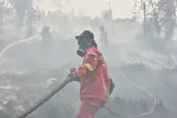 Pekanbaru, Pelalawan upgrade to 'emergency response' as Riau haze worsens