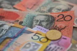 Australian dollar extends winning streak to ninth week as rate outlook shifts