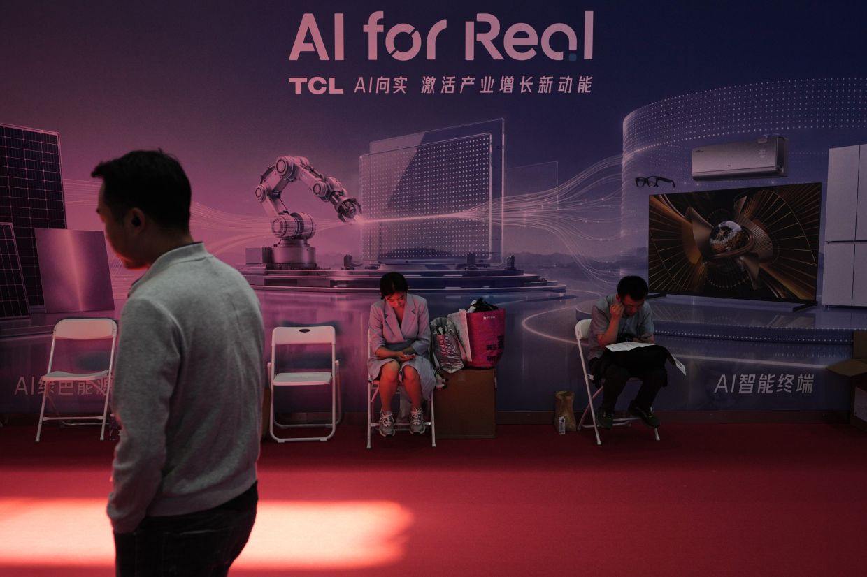 Workers in China worry over being replaced as they adapt to growing impact of AI