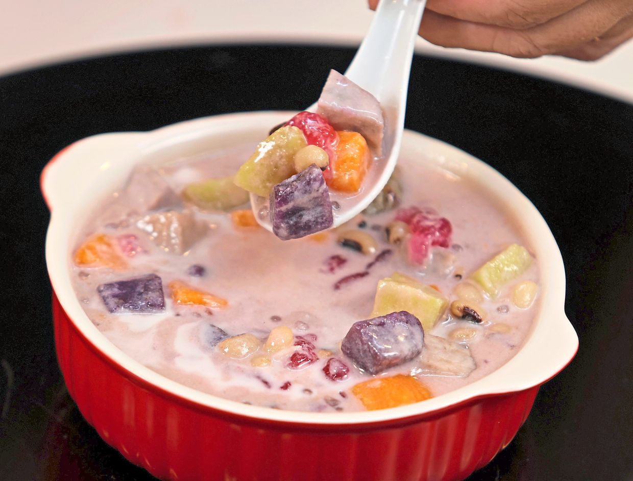 Sweet potato chunks, taro, sago and cha-cha in fragrant coconut milk make this a cheerful dessert.
