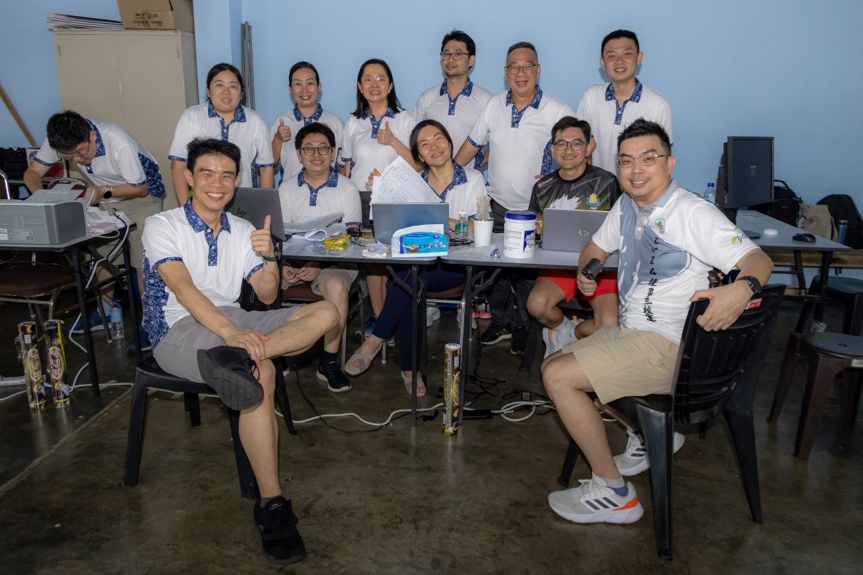 Some of the organising committee members smiling for the camera after a successful tournament.