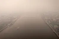 Indonesia escalates battle against fires and putrid haze