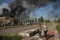 Russian strike on Kyiv-area ammunition depot triggers blast, killing 37