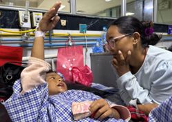 Nepal floods: Mother reunited with eight-year-old who climbed trees to survive
