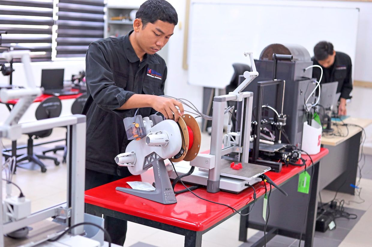 Fully focused: Students operating machinery at Shah Alam Vocational College, reflecting the growing role of technology in technical and skilled work as industries evolve.