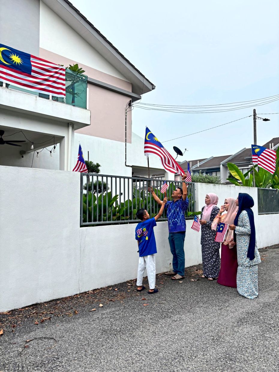 For Mohd Khusairi and his family, decorating his house annually for National Day has become something he looks forward to. — Courtesy photo