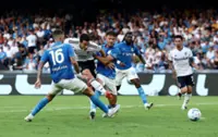 Soccer-Inter make it two wins from two, Napoli beaten at home by Como