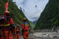 China penalises 10 people for misinformation over deadly mudslide