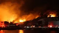 Large fire spreads in central Japan shopping district near sacred Shinto shrine