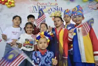 Kids embrace National Day spirit in their own way