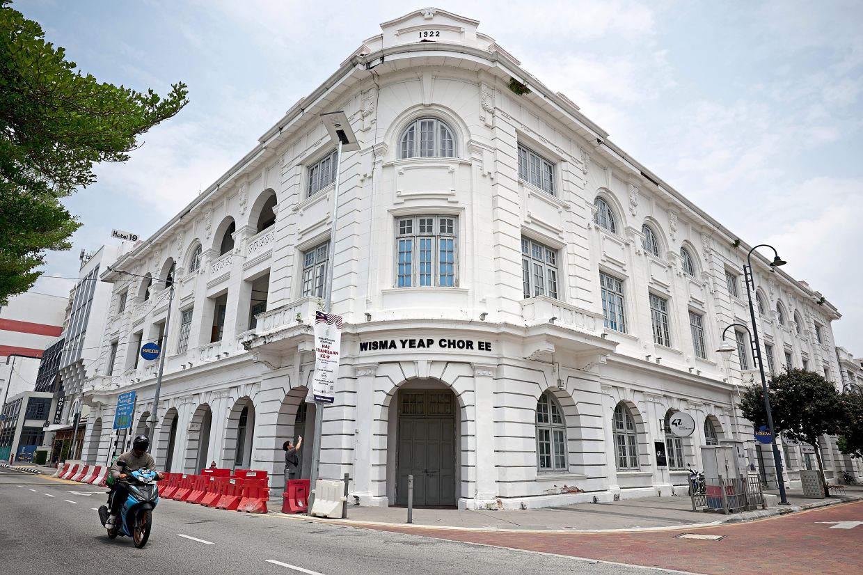 Gat Lebuh China in George Town is flanked by majestic heritage buildings such as Wisma Yeap Chor Ee, now housing Digital Penang. — CHAN BOON KAI/The Star