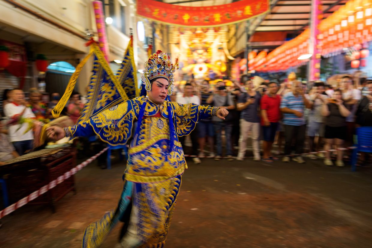 A Chinese opera performer takes part in a procession during the recent Hungry Ghost Festival in Bukit Mertajam in Penang. Photo: AP
