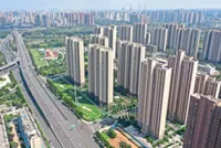 Developers slide amid new housing rules
