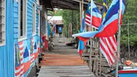 Island folk keep National Day spirit alive despite hardship