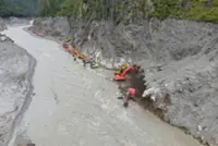 Rescuers race to reopen highway to mudslide-hit border port in Xizang, China