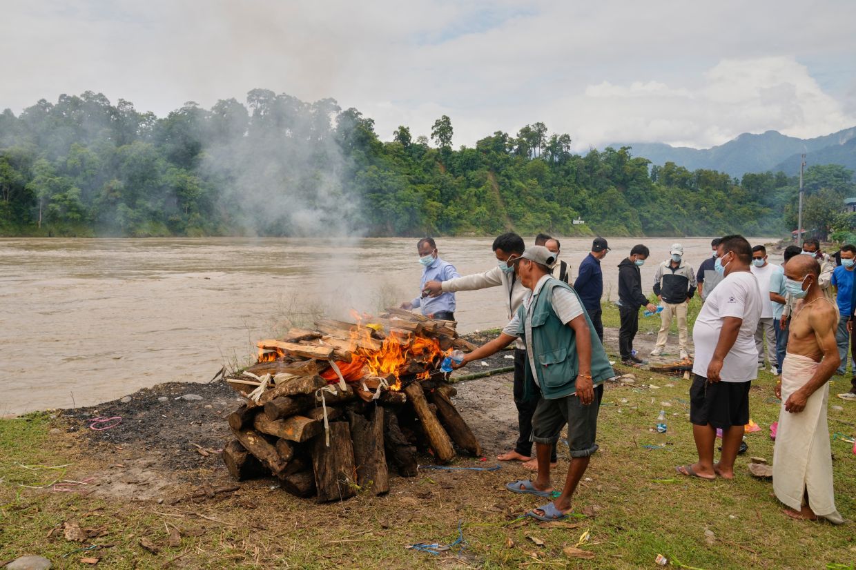 Relatives and friends cremate Aayush Khadka, who was killed in flash floods, in Chitwan, Nepal, Monday, Aug 31, 2026. - Photo: AP