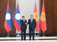 Laos, Kyrgyzstan presidents hold first bilateral meeting