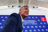 Clooney tells Venice festival that AI threatens film and journalism