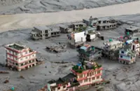 Nepal to rebuild early-warning system on China border after deadly flood, sources say