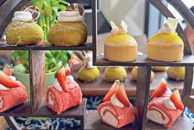 (Clockwise from right) Pahang Nangka Madu and Cheese Tarts, Cameron Highlands Strawberry Mini Swiss Rolls and Raub Durian Cream Puffs. 