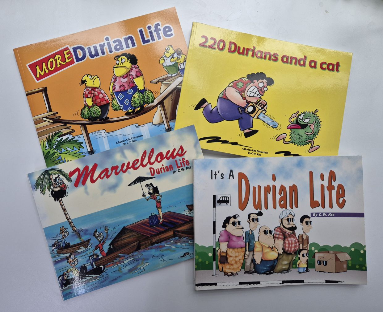 Four of Kee’s comic books that capture his unique take on Malaysian life and humour. Photo: The Star/Sheela Chandran