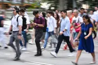 Singapore employers remain cautious on wages, hiring despite improved outlook