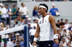 Tennis-Lucky loser Bu sends Jodar out of US Open in rain-affected opener