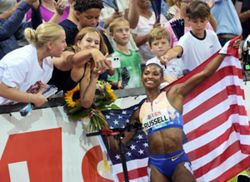 Athletics-American hurdler Russell senses more to come after world record