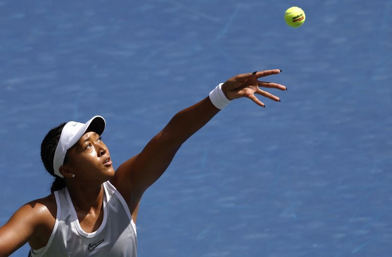 Tennis-Osaka holds her nerve to reach US Open third round