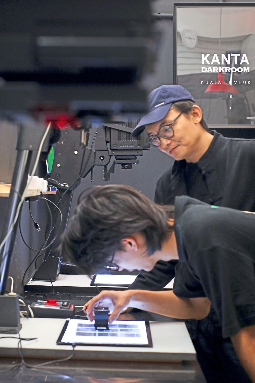 For a minimal fee, newcomers can join an orientation session to gain a hands-on understanding of a darkroom. Photo: The Star/Leong Wai Yee