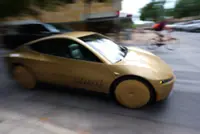 Musk launches steering-wheel-free taxi service in bet riders lose 'no control' fears and hop inside