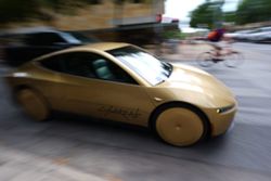 Musk launches steering-wheel-free taxi service in bet riders lose 'no control' fears and hop inside