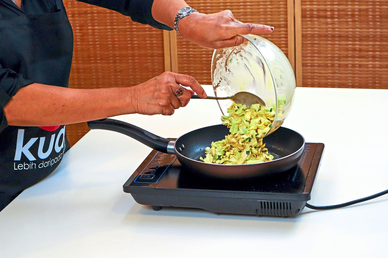 Heat two tbsp oil in a skillet over medium heat. Once hot, add the savoury cabbage mixture.