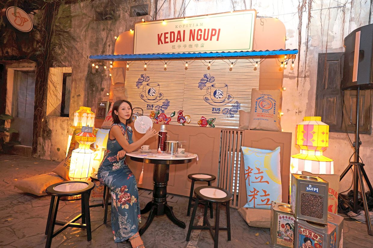 The ‘kopitiam’ installation connects coffee with Malaysia’s harvest traditions.