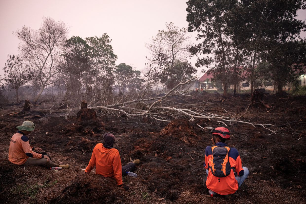 Indonesia steps up fight against wildfire that sparked hazardous haze