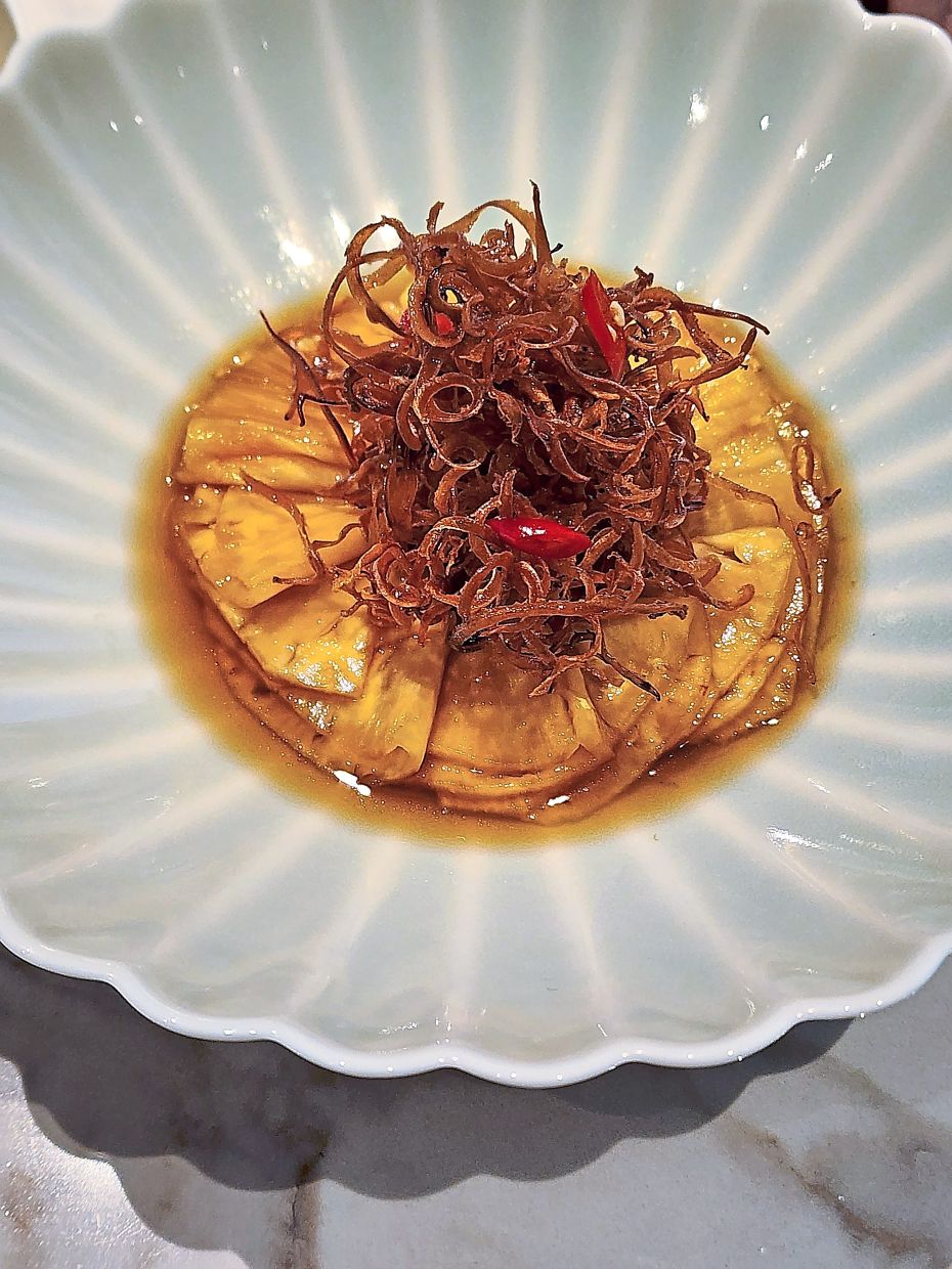 Pickled pineapples, soy sauce, chillies and cuttlefish make for excellent companions.