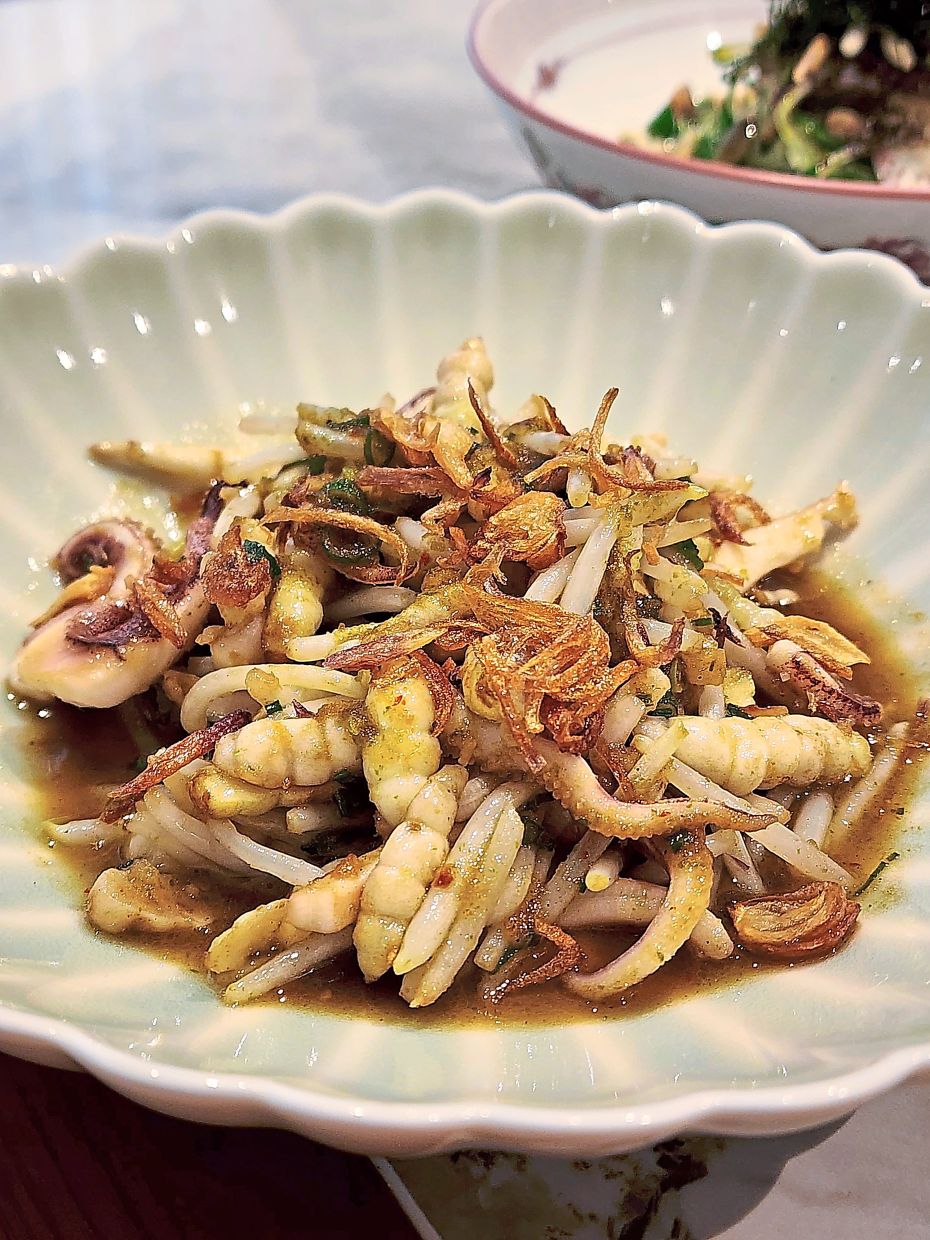 The crones, beansprouts and squid deliver a potent punch of flavours and textures.