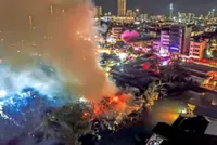 Firemen race to save Chew Jetty from blaze