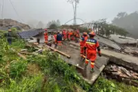 Mudslide kills two and leaves 10 missing in China after heavy rain from Typhoon Saudel