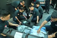 Singapore police help with disaster victim identification in Nepal