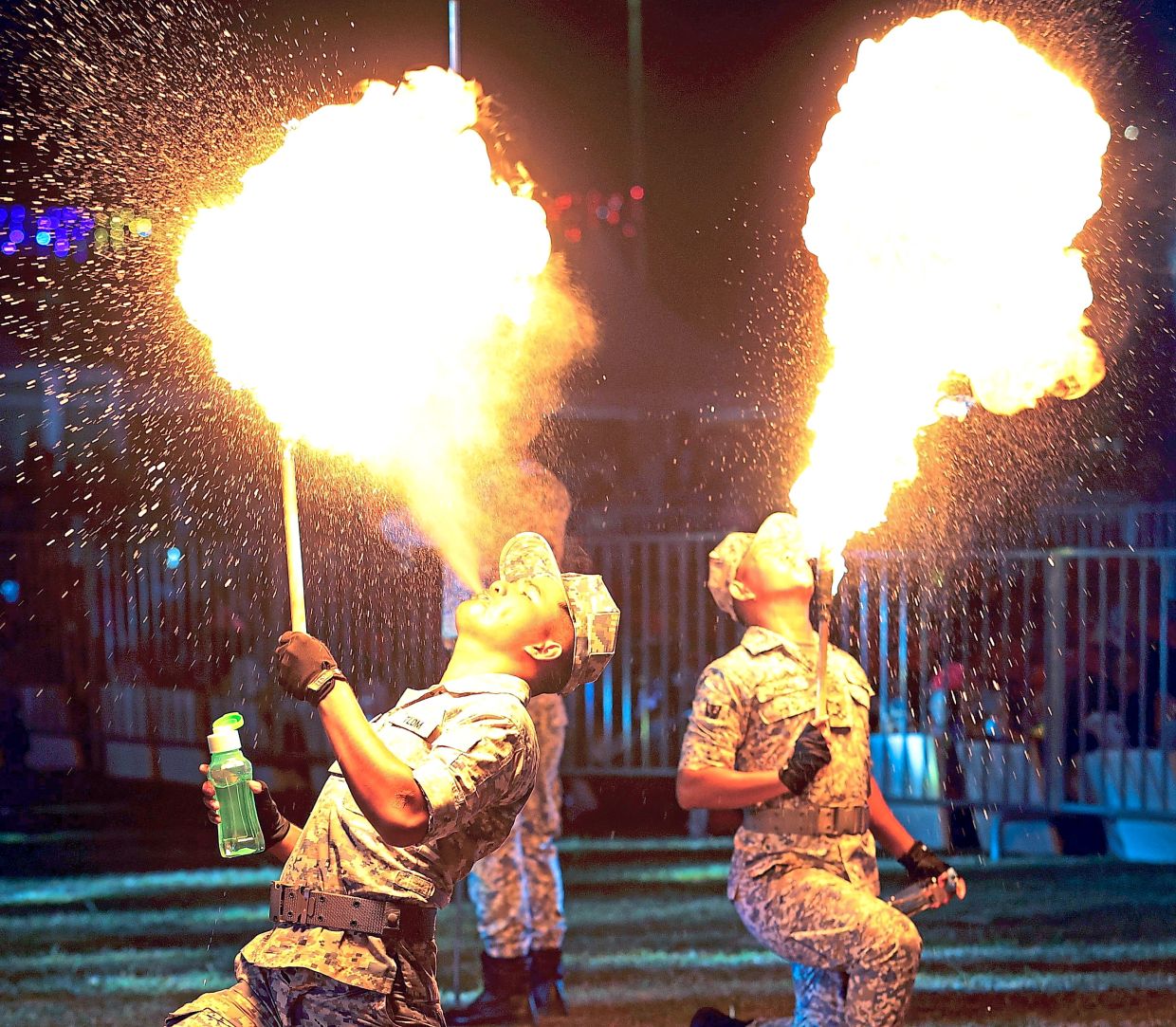 Malaysia’s armed forces also displayed their prowess, including fire-breathing. — Photos: CHAN TAK KONG/The Star