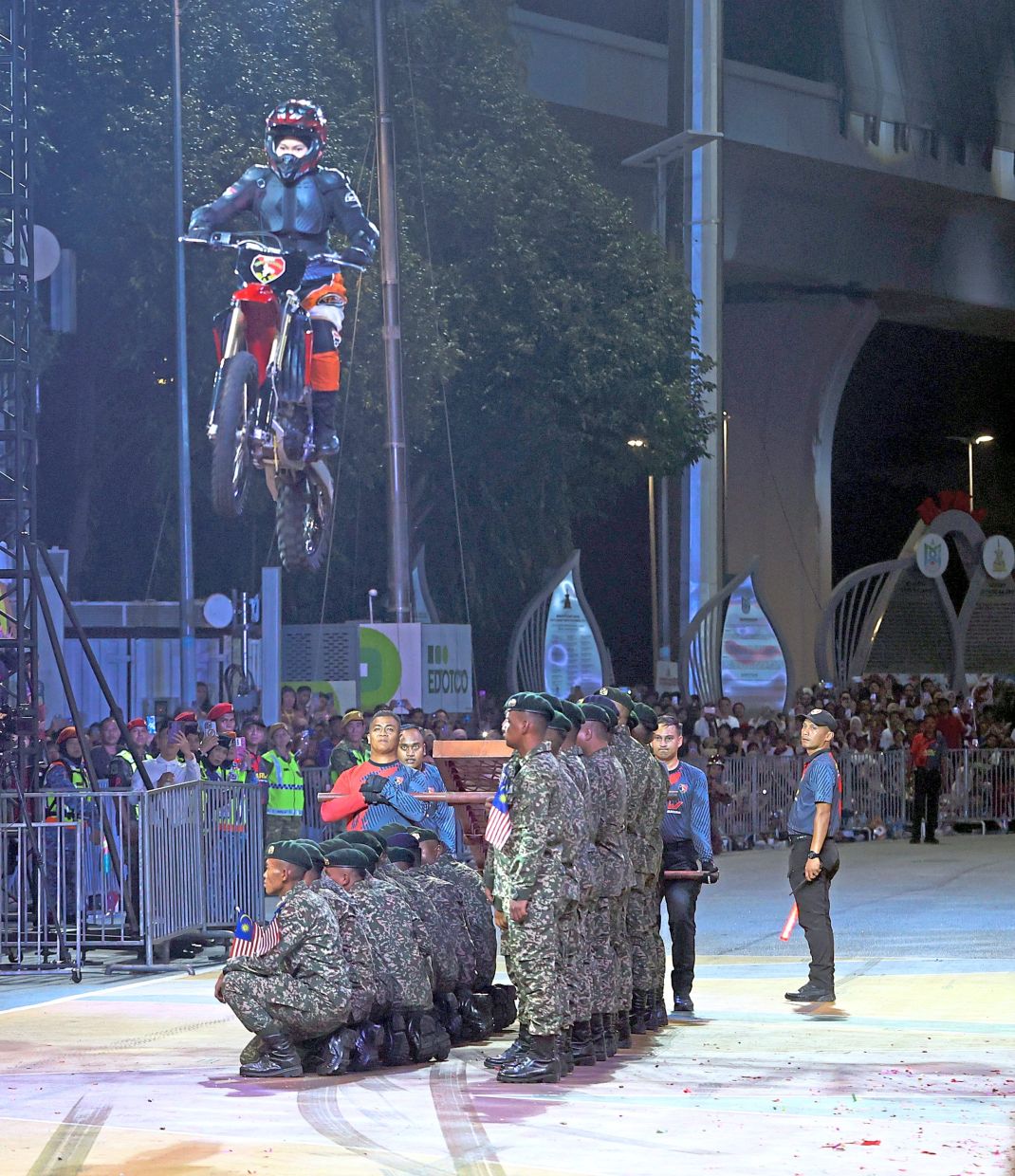 Malaysia’s armed forces also displayed their prowess, including motorcycle tricks.—CHAN TAK KONG/The Star