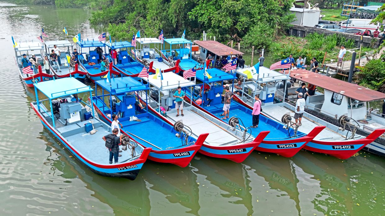 The fishermen’s brand new fleet of boats berthed at Gertak Sanggul. — Photos: Handout 