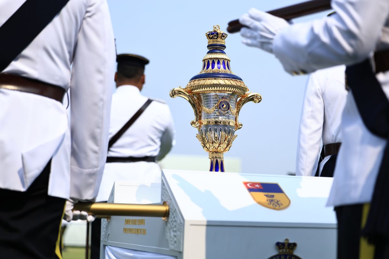 Featuring motifs inspired by Johor's royal and polo heritage, the championship trophy combines fine silver, 24-karat gold, rhodium, lapis lazuli and gemstones.