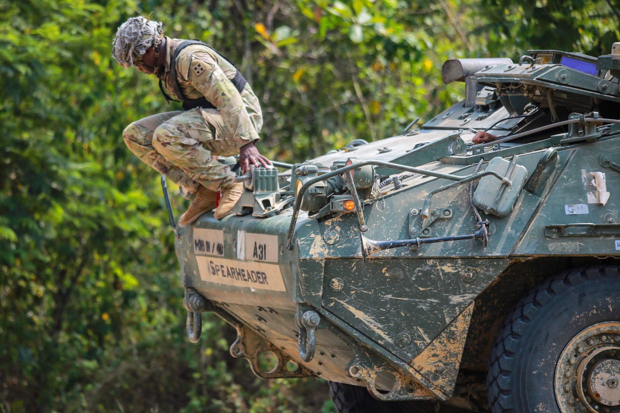 A US soldier dismounts from a Stryker armoured vehicle during the Garuda Shield joint multinational exercise at the Baturaja combat training centre, South Sumatra province, on Monday, September 7, 2026. -- Photo by PERDIANSYAH / AFP