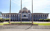 Ex-Felda GM brought to court for remand hearing