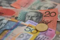 Aussie hovers near 4-month peak against dollar, close to 13-year top on kiwi